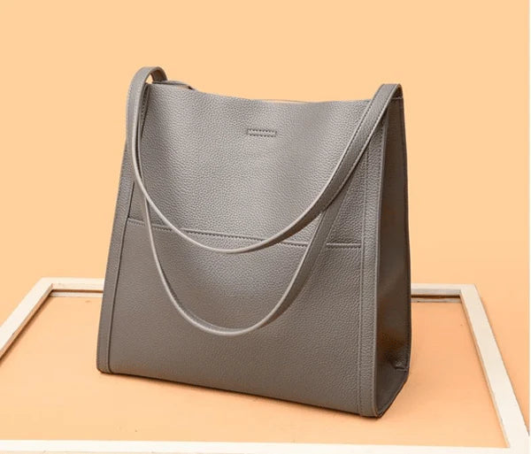 Lirà™ | Sac à bandoulière sobre et uni en cuir véritable