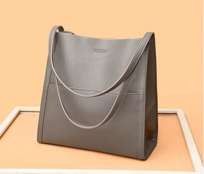 Lirà™ | Sac à bandoulière sobre et uni en cuir véritable