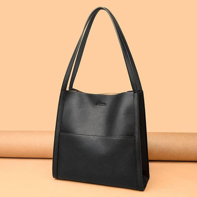 Lirà™ | Sac à bandoulière sobre et uni en cuir véritable