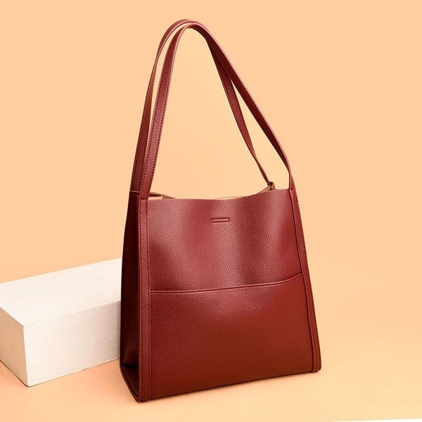 Lirà™ | Sac à bandoulière sobre et uni en cuir véritable
